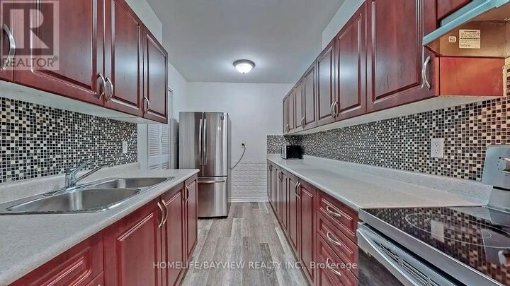 Property Photo: 1 Massey Square 1803 ON M4C 5L4