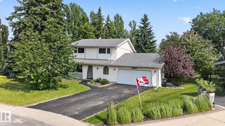 Property Photo: 14703 58 Ave NW AB T6H 4T3