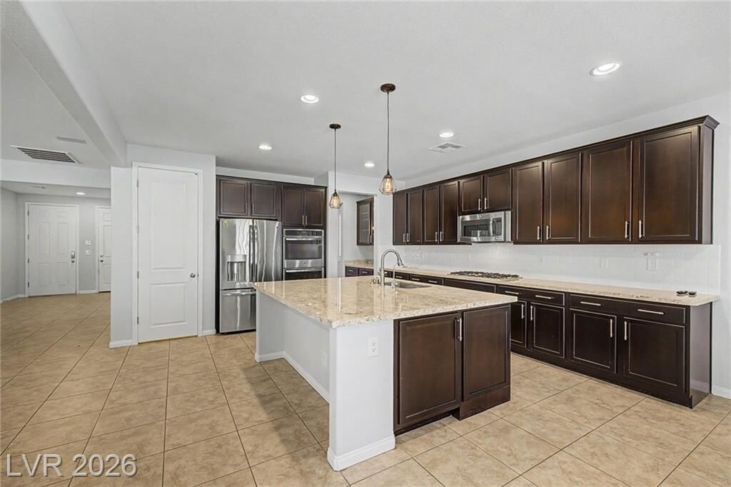 Property Photo:  4818 Al Carrison Street  NV 89149 