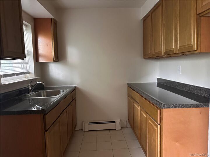 Property Photo:  400 N Corona B3  NY 11580 