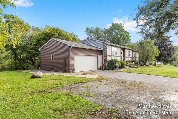 Property Photo: 3395 12 Mile Road NW MI 49345
