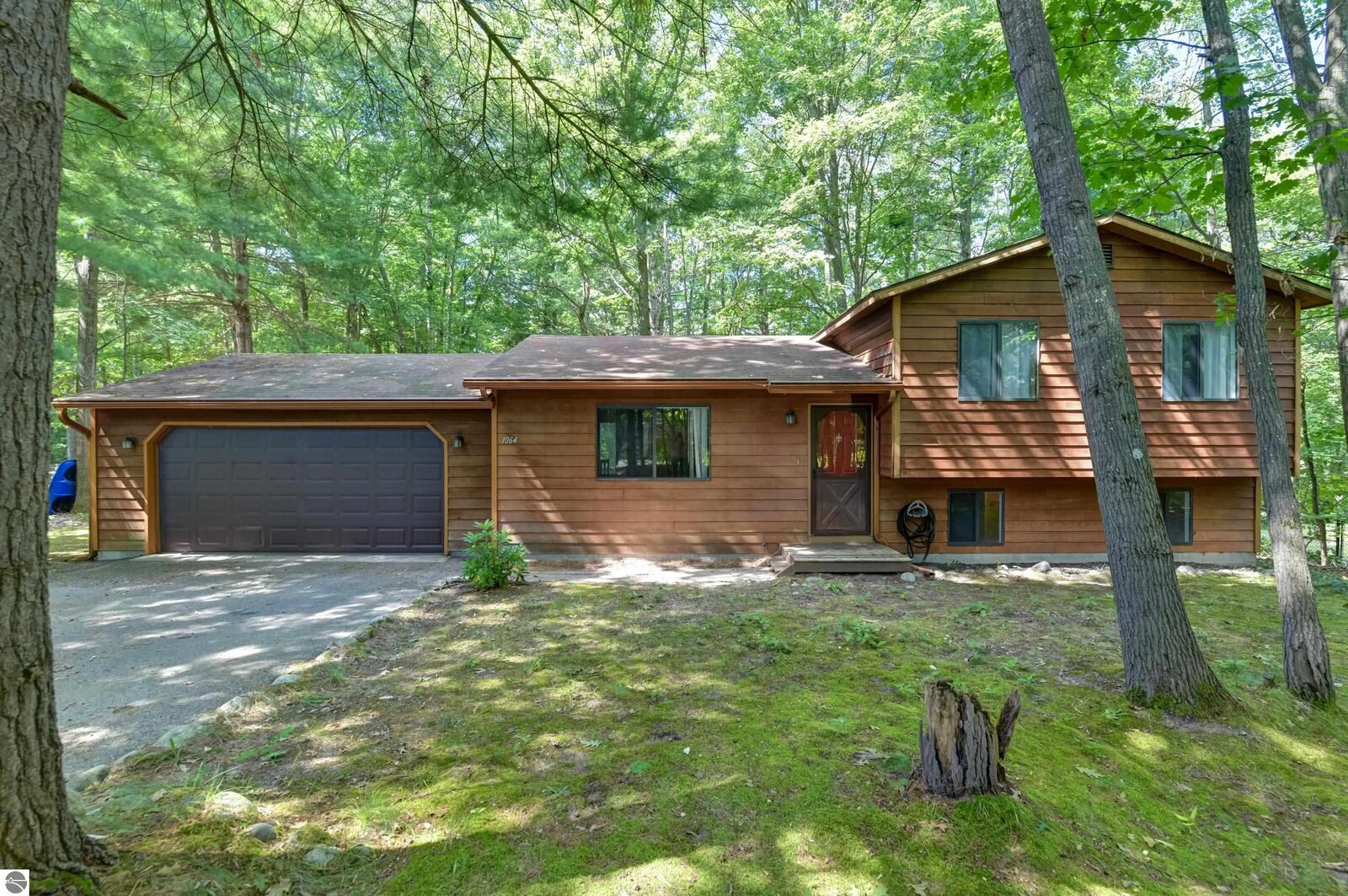 Property Photo:  1064 S South Long Lake Road  MI 49643 
