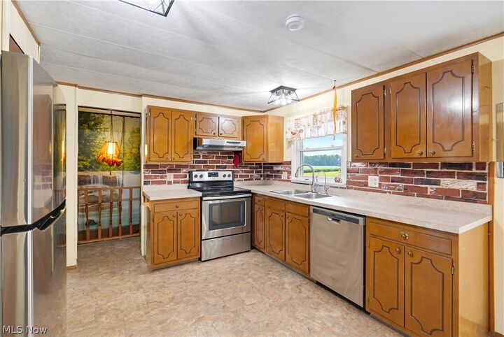 Property Photo: 6240 Woodard Road OH 44003