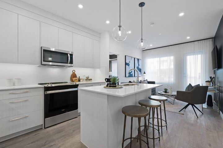 Property Photo:  6 Merganser Drive W 1401  AB T1X 2Y2 