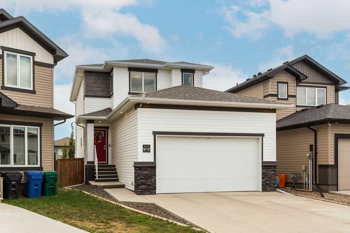 Property Photo: 599 Moonlight Lane W AB T1J 5M1