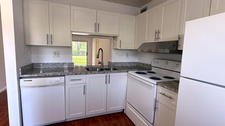 Property Photo:  114 NW 60th Avenue 3-1  FL 33063 