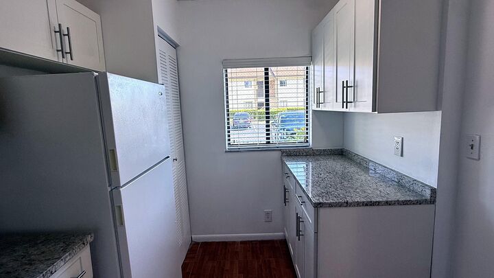 Property Photo:  114 NW 60th Avenue 3-1  FL 33063 
