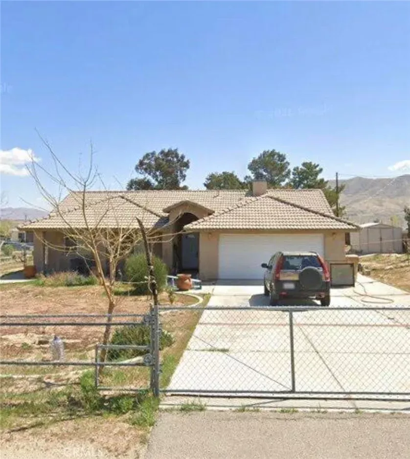Property Photo:  9009 Piedra Avenue  CA 92345 