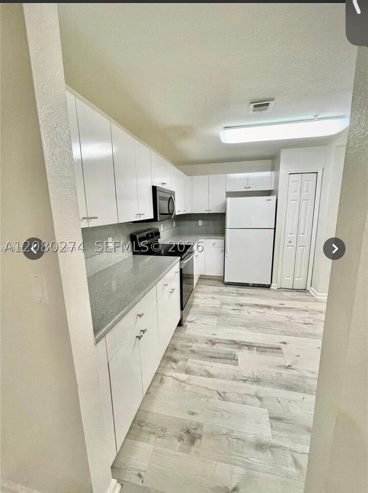 Property Photo: 10902 NW 83 St 219 FL 33178