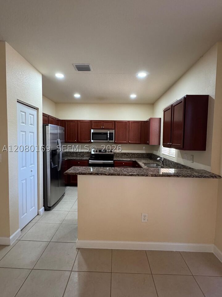 Property Photo:  14720 SW 25th Ln 14720  FL 33185 