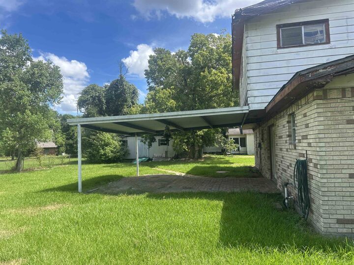 Property Photo:  1412 Missouri St  TX 77630 