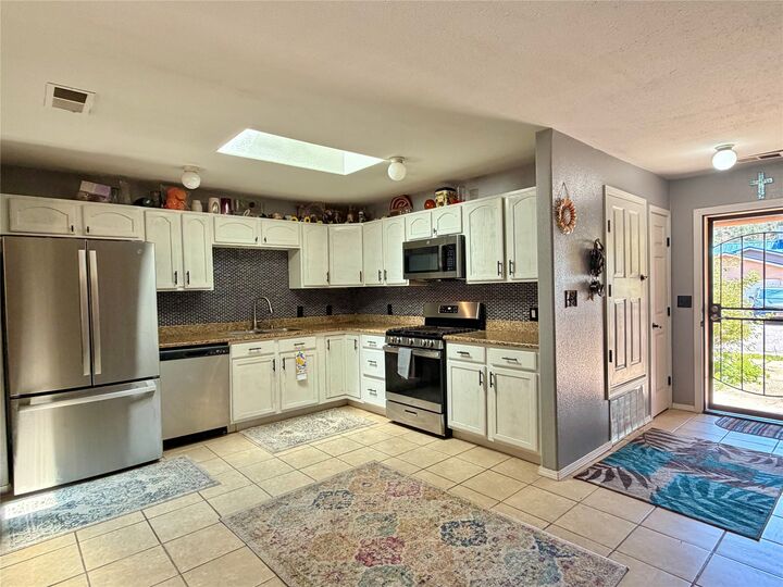 Property Photo:  10 Camino Gemma  NM 87552 