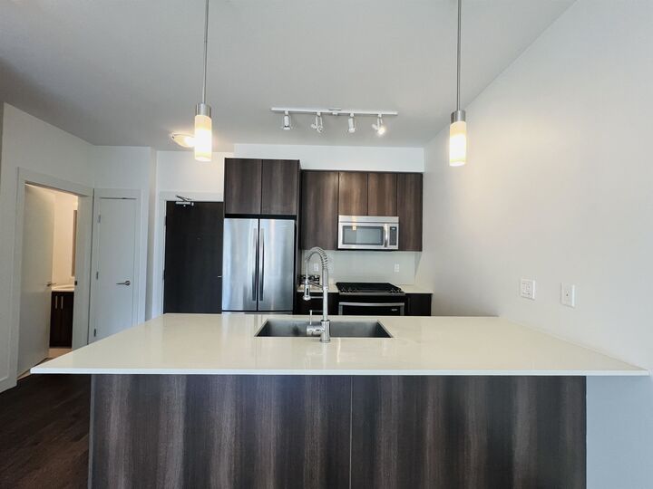 Property Photo:  7058 14th Avenue 416  BC V3N 0E6 
