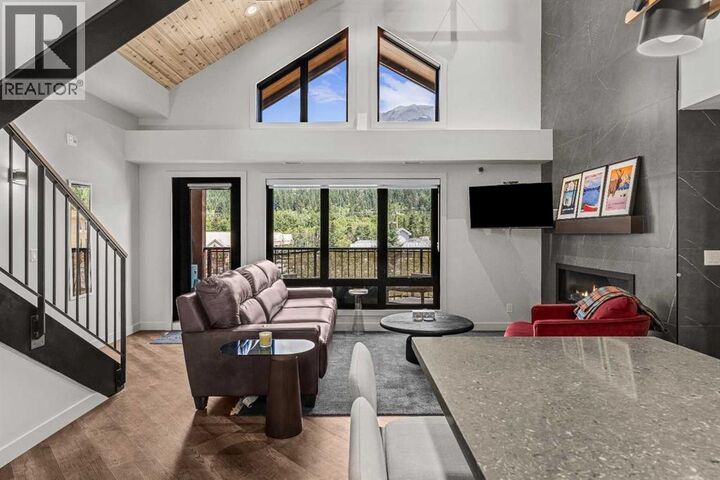 Property Photo:  1730 Bow Valley Trail  AB T1W 2X3 