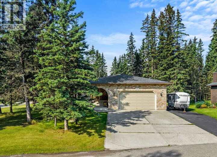Property Photo:  63 Wolf Drive  AB T3Z 1A3 