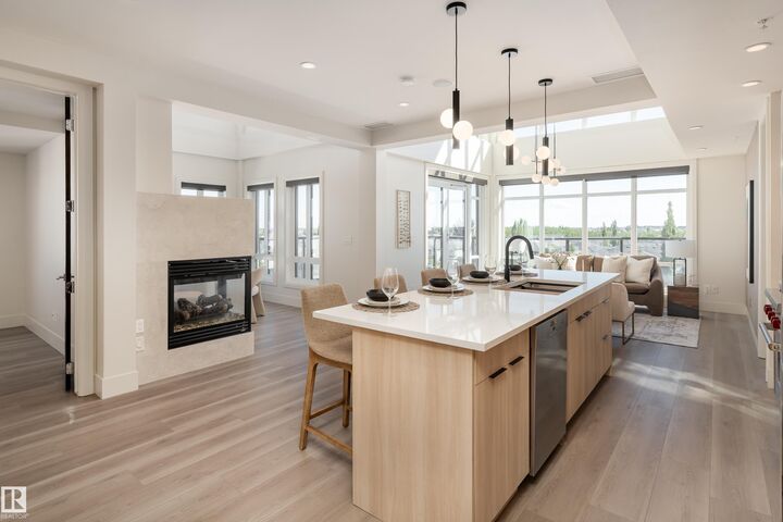 Property Photo:  1350 Windermere Way SW 401  AB T6W 2J3 