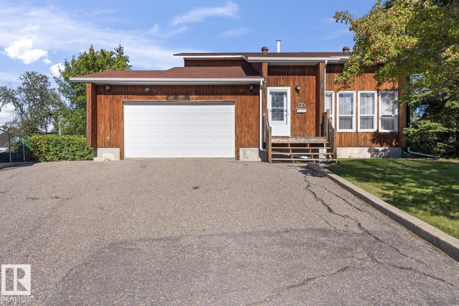 Property Photo:  1102 13 Avenue  AB T9M 1J4 