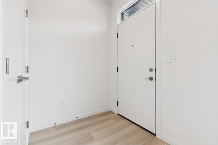 Property Photo:  8148 228 Street NW  AB T5T 7X9 