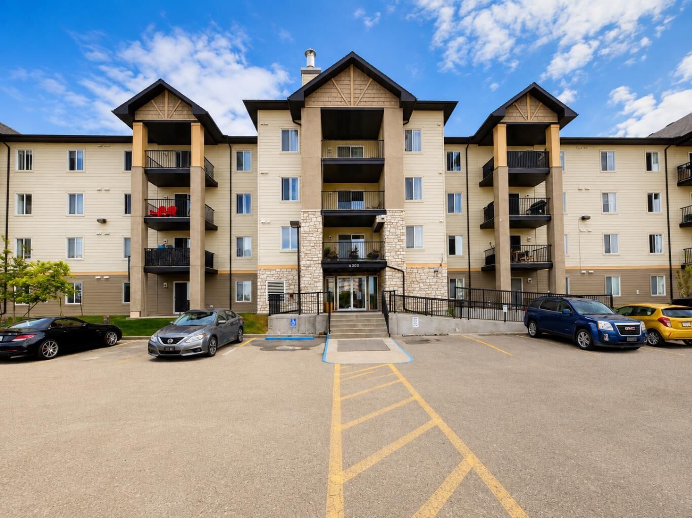 Property Photo:  304 Mackenzie Way SW 6101  AB T4B 3H4 