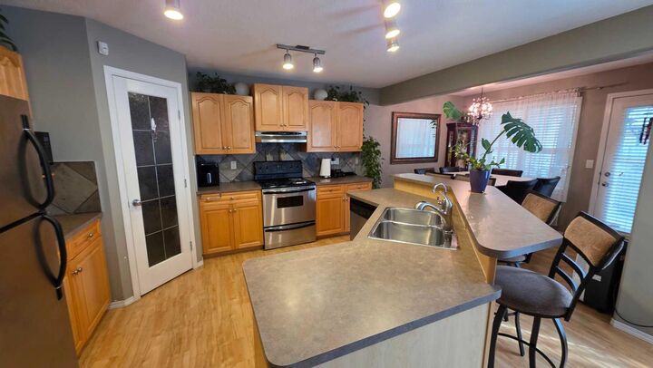 Property Photo:  9209 129 Avenue  AB T8X 1R5 