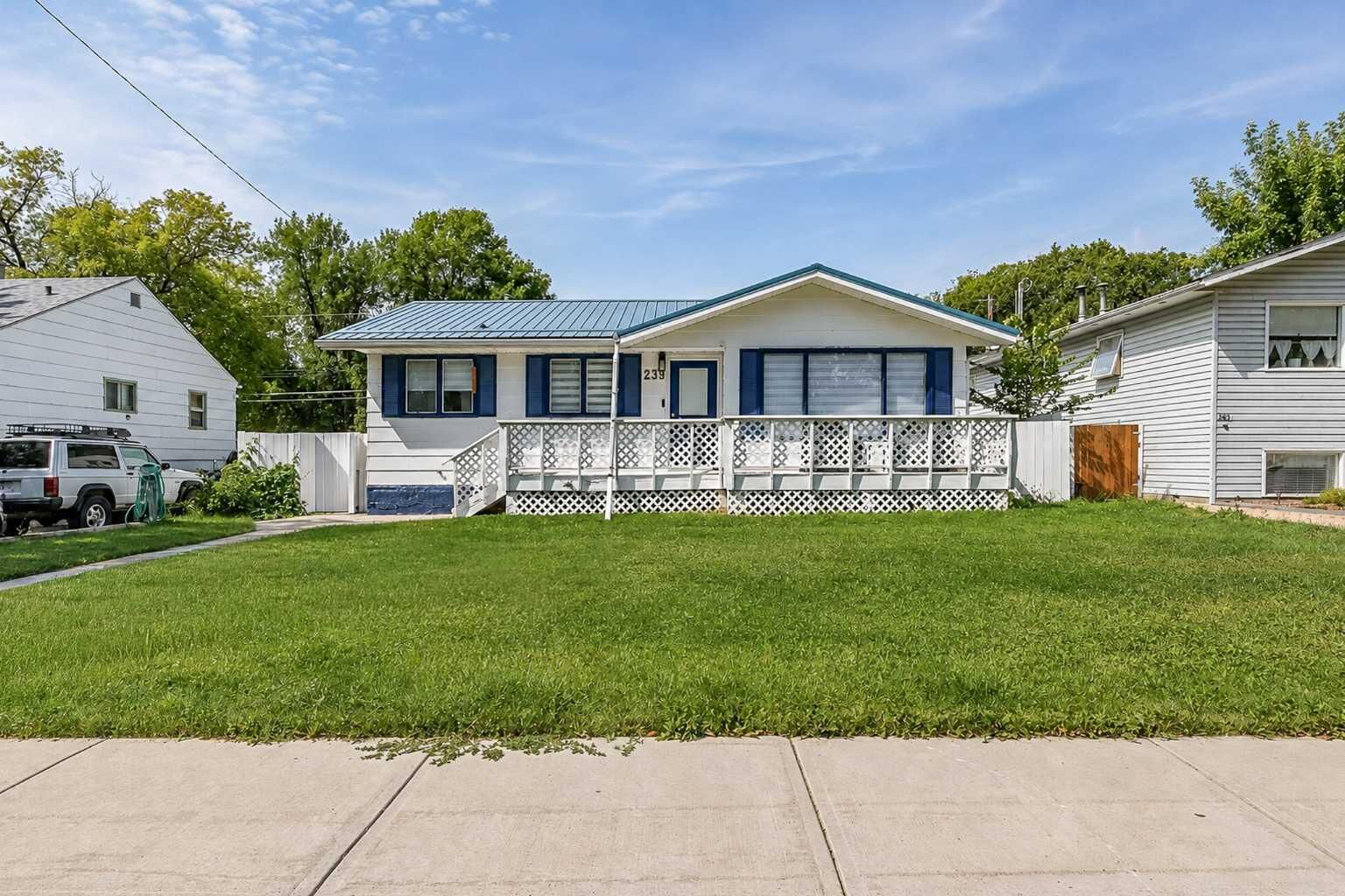 Property Photo:  239 2 Street E  AB T1R 0G8 