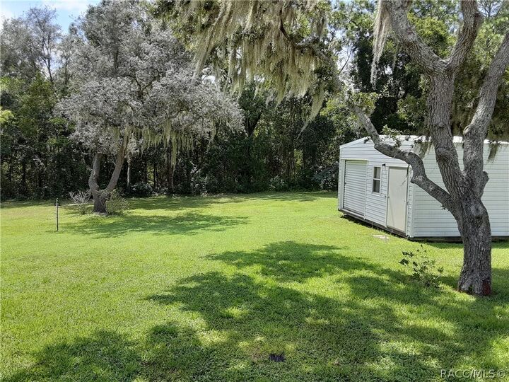Property Photo: 1350 W Buttonbush Drive FL 34465