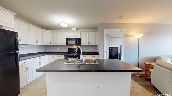 Property Photo:  600 Centennial Boulevard 210  SK S0K 4S1 