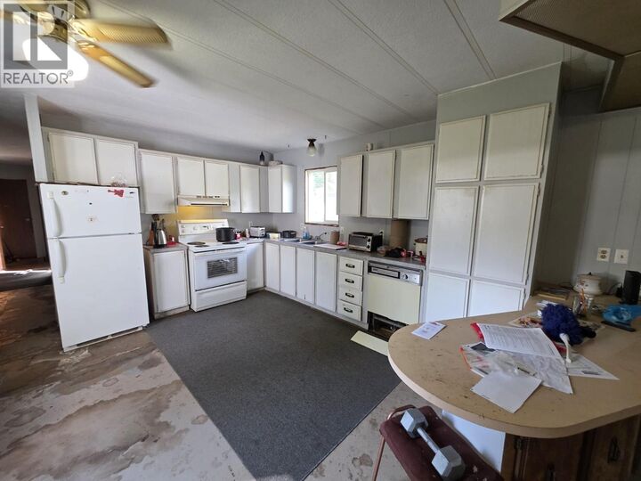 Property Photo:  7729 Emerald Drive  BC V2K 4A6 