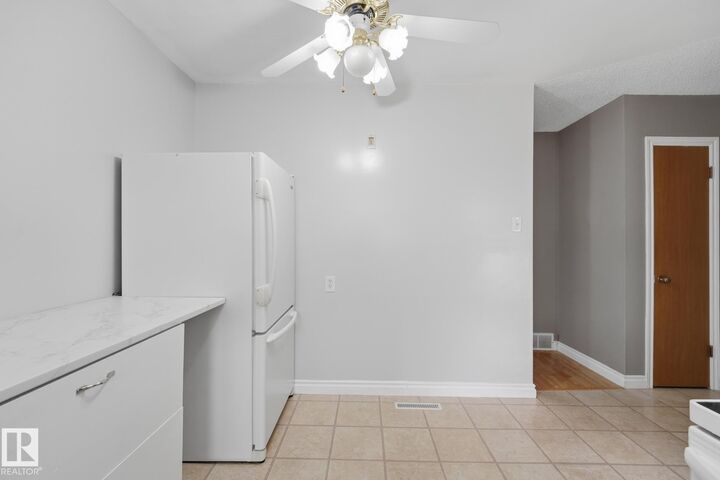 Property Photo:  13304 63 Street NW  AB T5A 0X1 