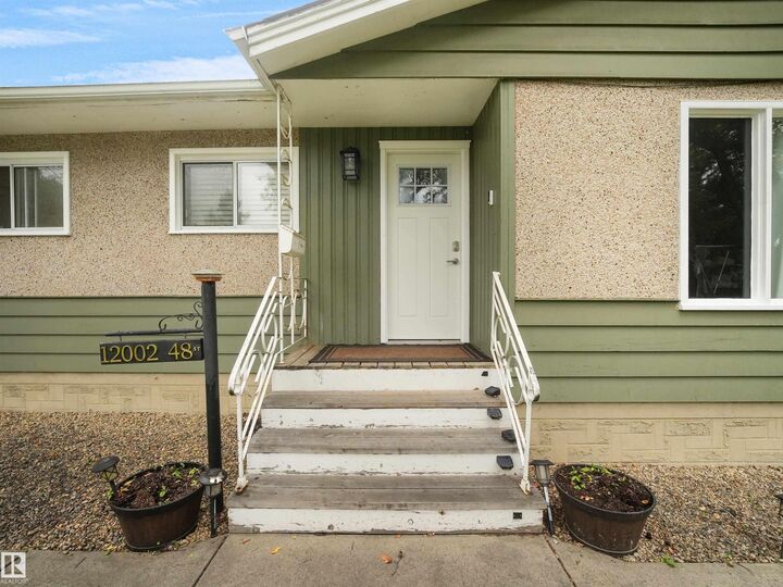 Property Photo:  12002 48 Street NW  AB T5W 2Y8 