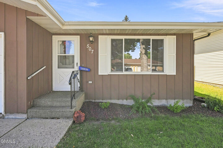 Property Photo:  507/509 Interstate Avenue E  ND 58503 