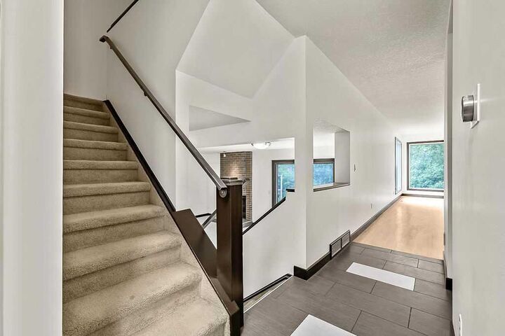 Property Photo:  200 Bernard Drive NW  AB T3K 2B7 