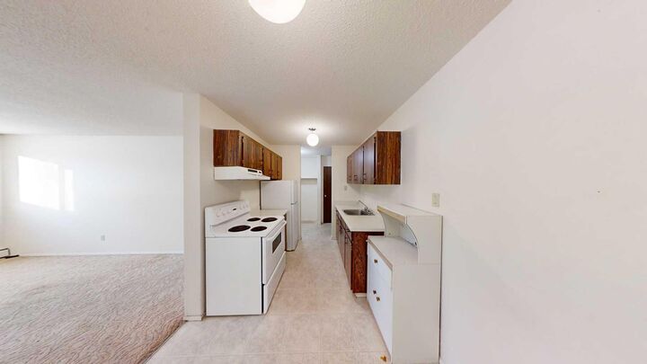 Property Photo: 9656 Hillcrest Drive 301 AB T8V 1B1