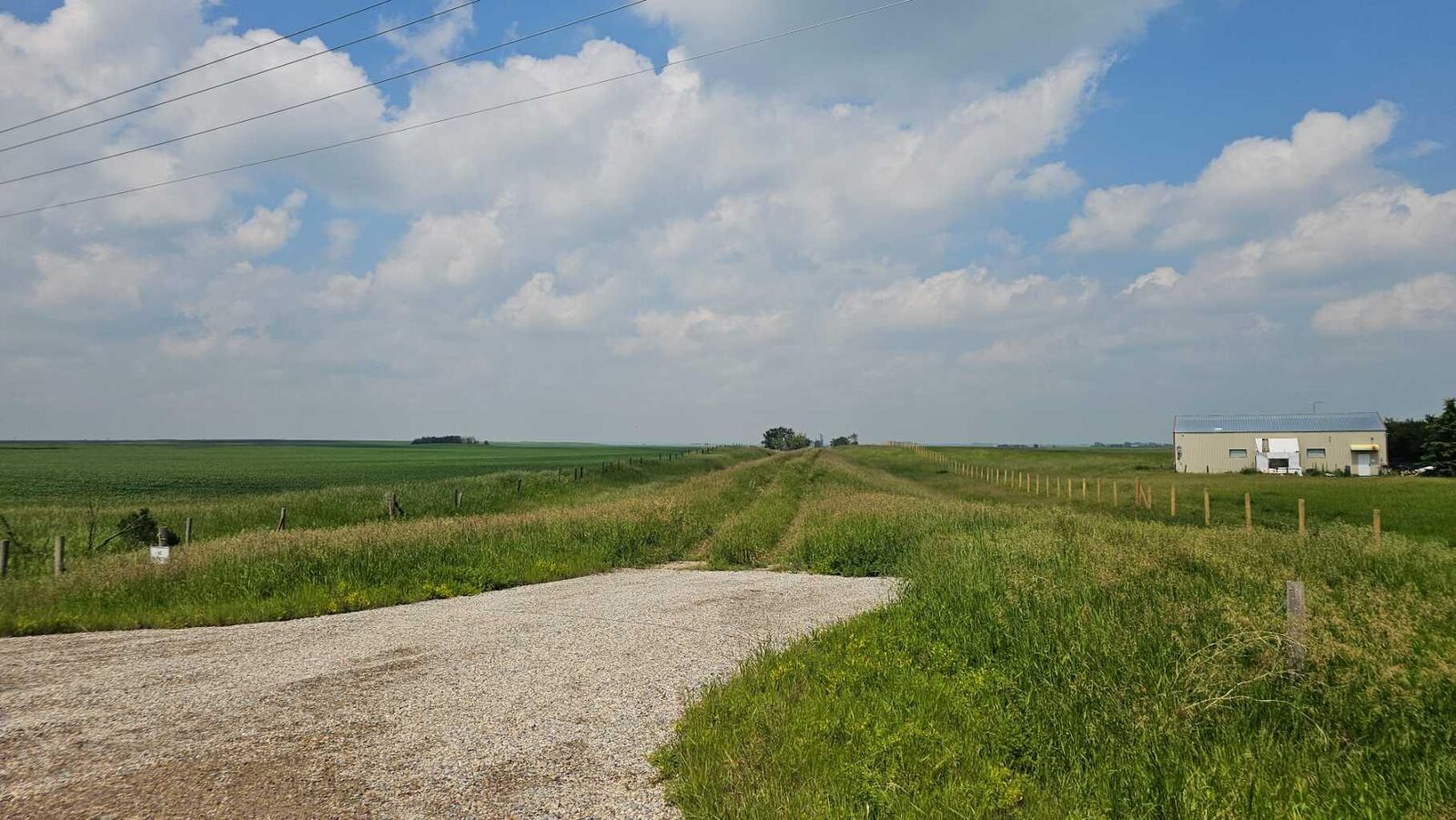 Property Photo:  270182 Inverlake Road  AB T1X 2E3 