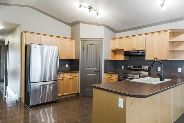 Property Photo:  11214 75A Avenue  AB T8W 0G5 
