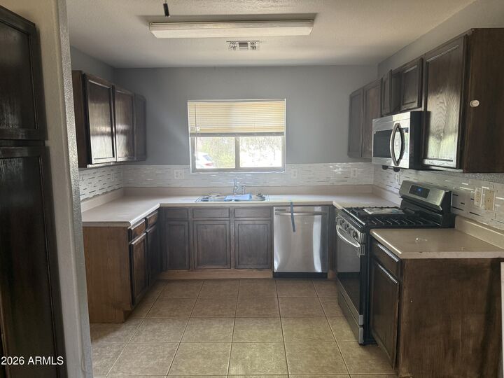 Property Photo:  1033 E Cowboy Cove Trail  AZ 85143 