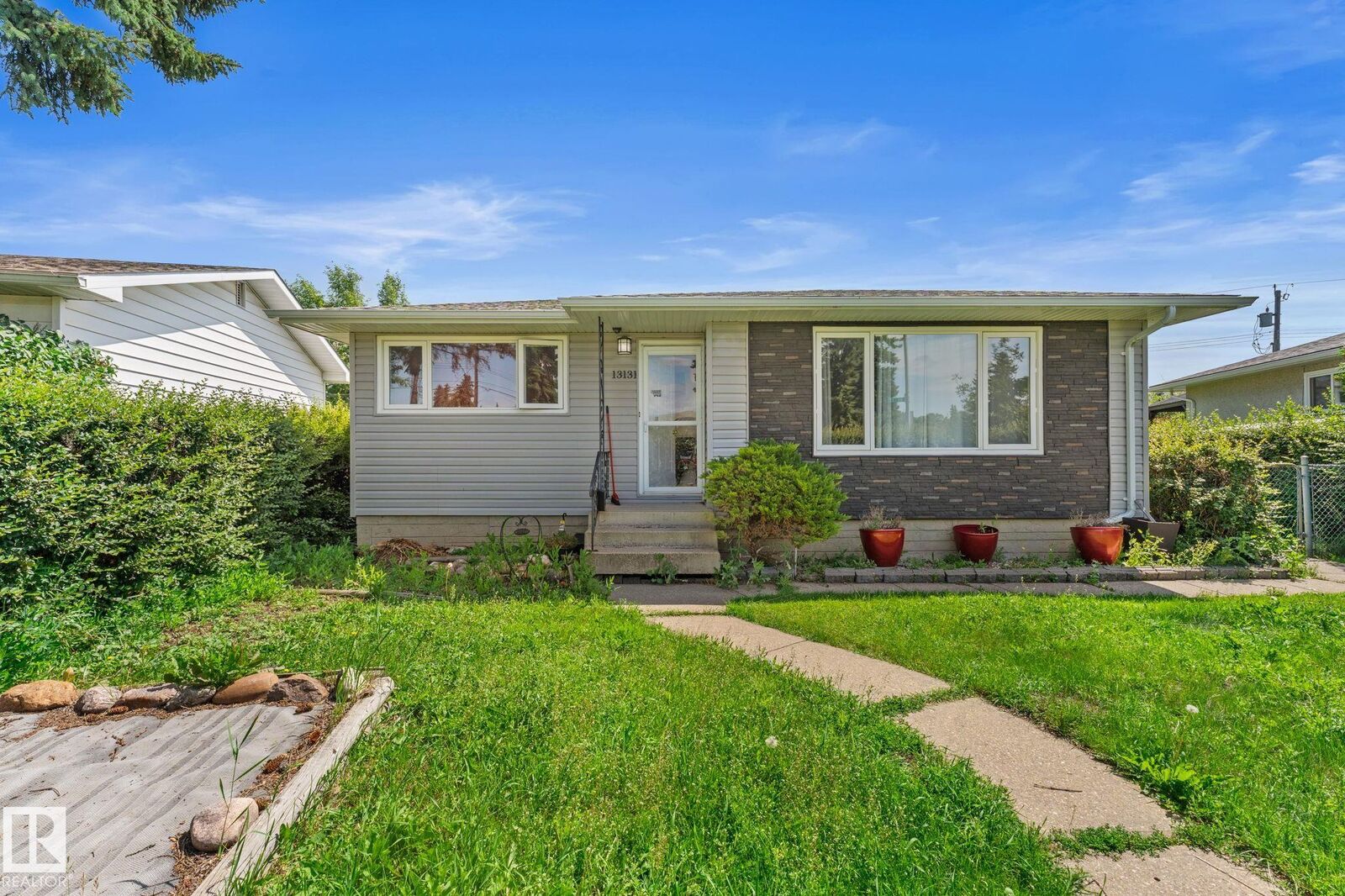 Property Photo: 13131 60 Street NW AB T5A 0S2