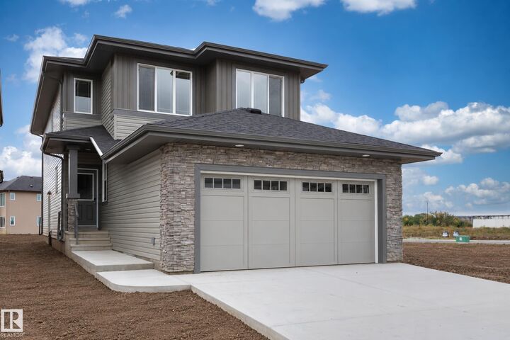 Property Photo:  6279 180 Avenue NW  AB T5Y 4L8 