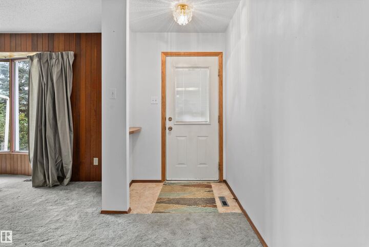 Property Photo:  8827 138 Avenue NW  AB T5E 2A7 