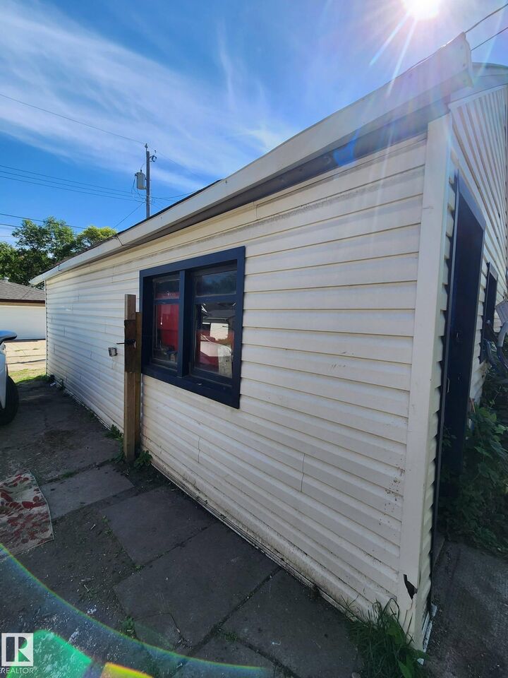 Property Photo:  11917 Fort Road NW  AB T5B 4G7 
