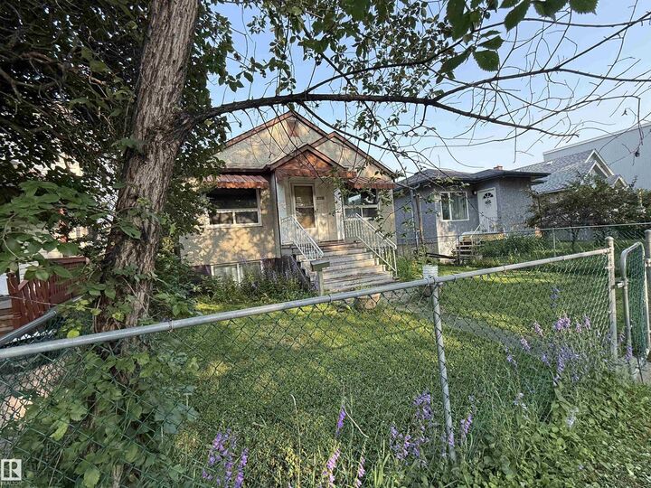 Property Photo:  11825 67 Street NW  AB T5B 1L9 