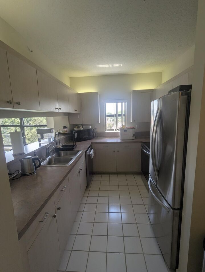 Property Photo:  200 Uno Lago Drive 405  FL 33408 