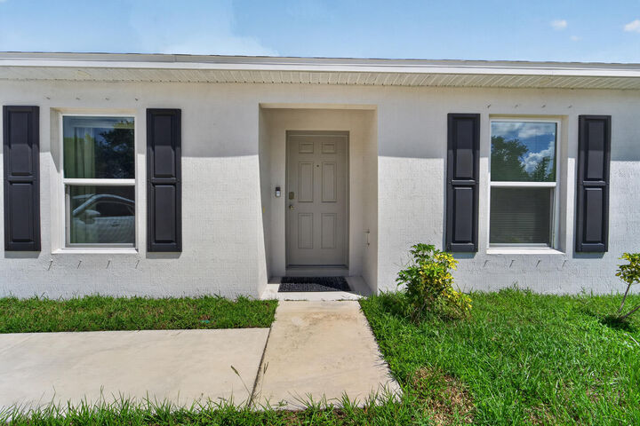 Property Photo:  1051 SW Becker Road  FL 34953 
