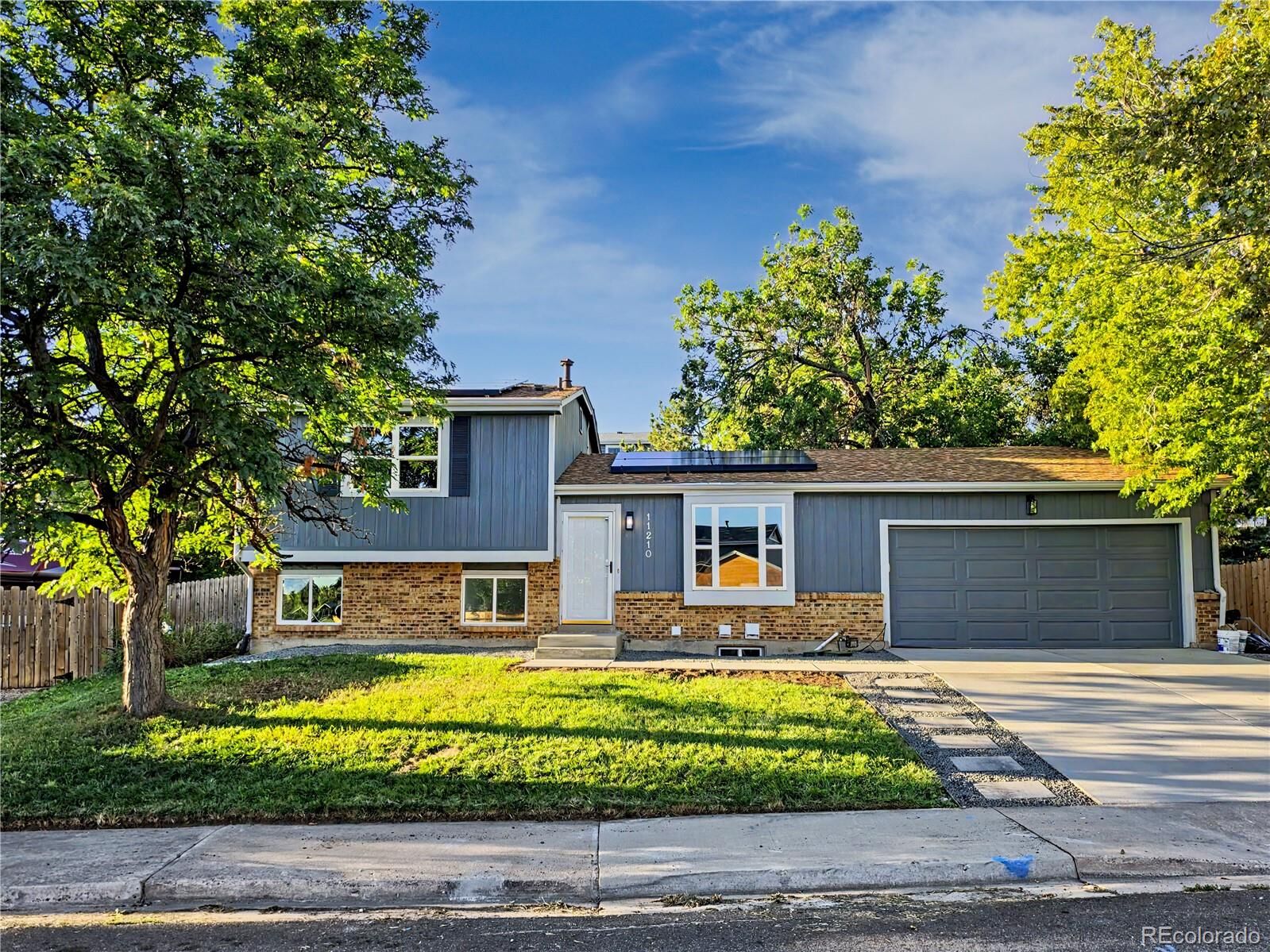 Property Photo: 11210 W Powers Avenue CO 80127