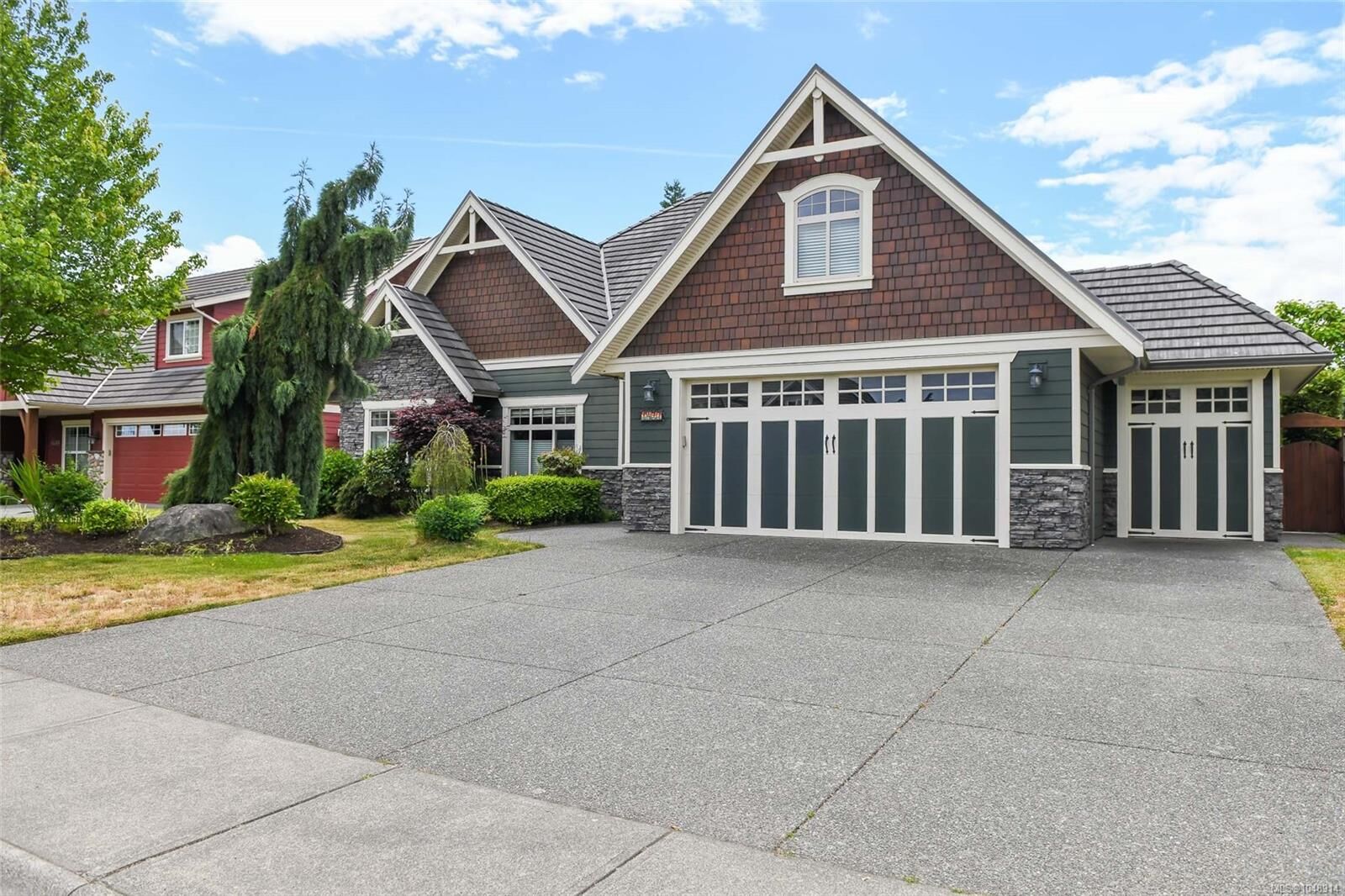 Property Photo:  1477 Crown Isle Dr  BC V9N 3Z5 