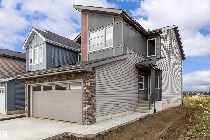 Property Photo:  8632 224 Street NW  AB T5T 7Z8 