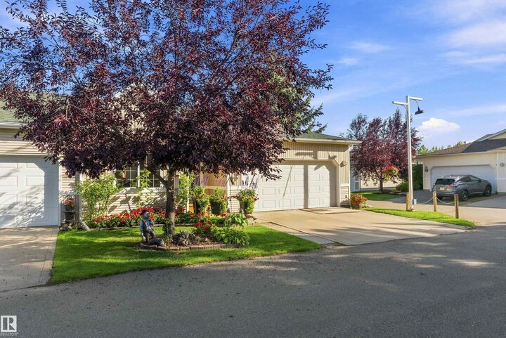 Property Photo:  1 Village Lane 20  AB T0C 2V0 