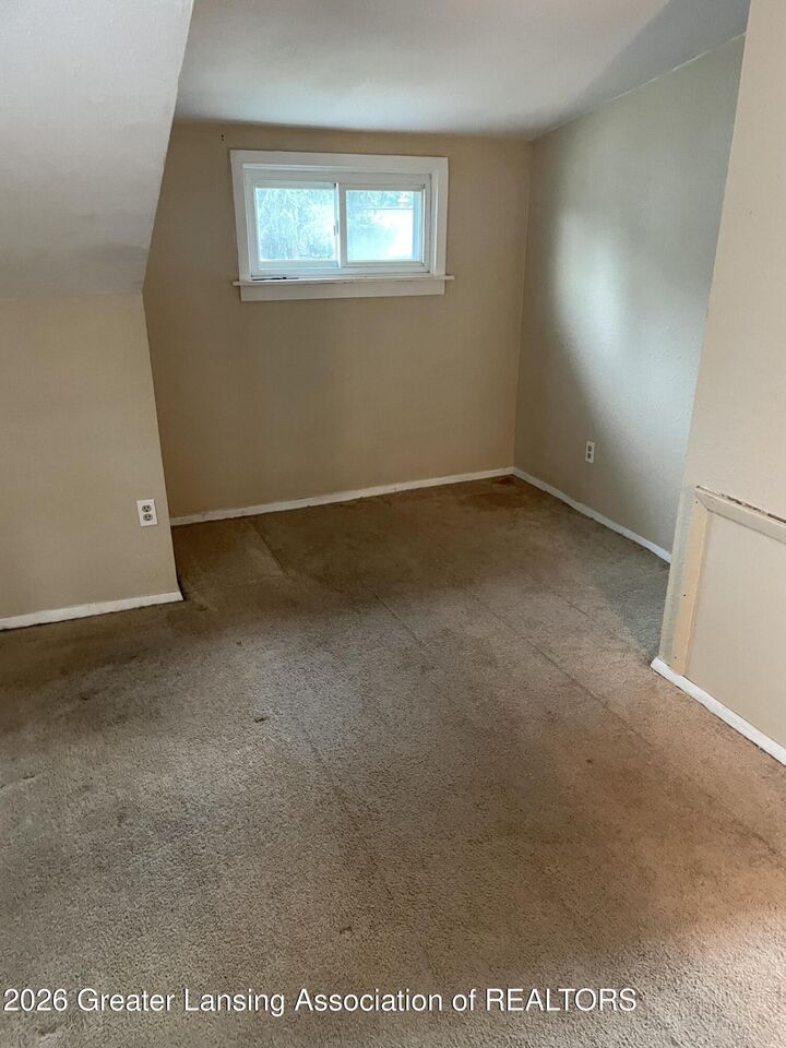 Property Photo:  1118 Berten Street  MI 48910 