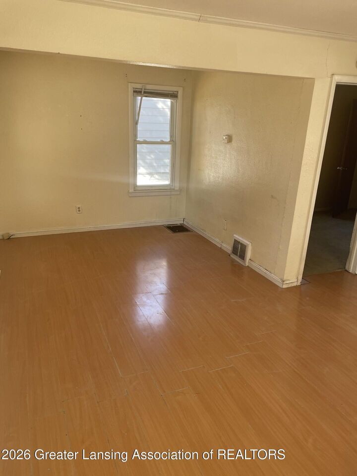 Property Photo:  1118 Berten Street  MI 48910 