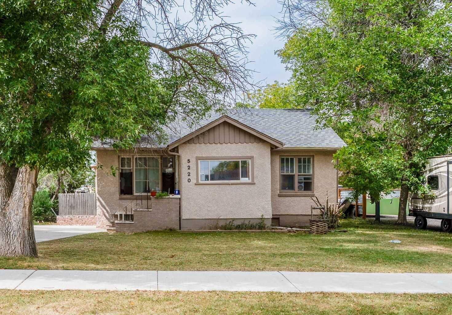 Property Photo:  5220 53 Street  AB T1G 1M4 